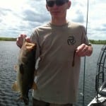 young angler bass fishing